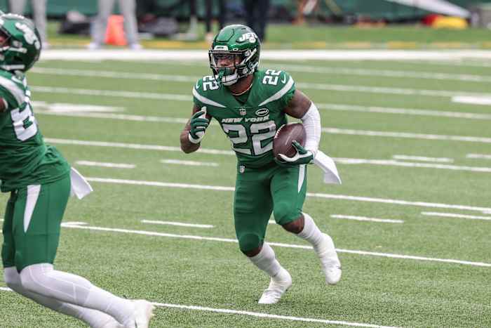 Jets RB La'Mical Perine rushing football